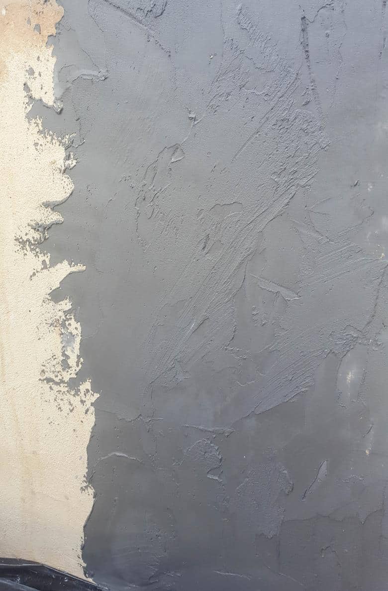 Work in sections to avoid the grout adhesive drying out