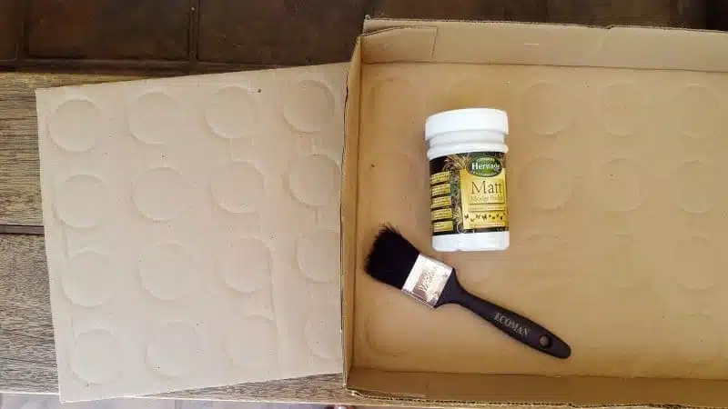 Cut the sides off the beer boxes