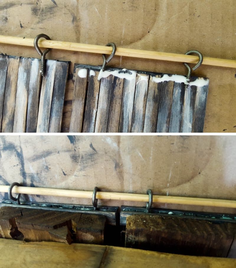 Glue another stirrer or ice cream stick to the top of the door and clamp