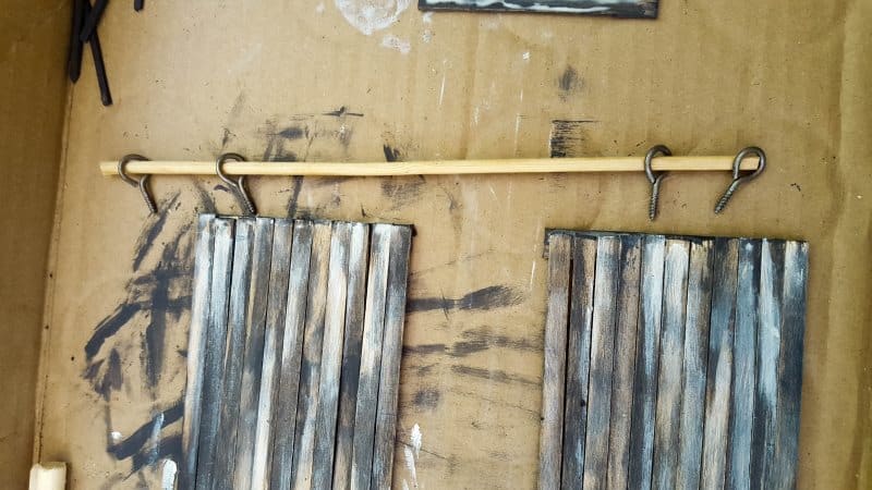 Thread the skewer through the hooks