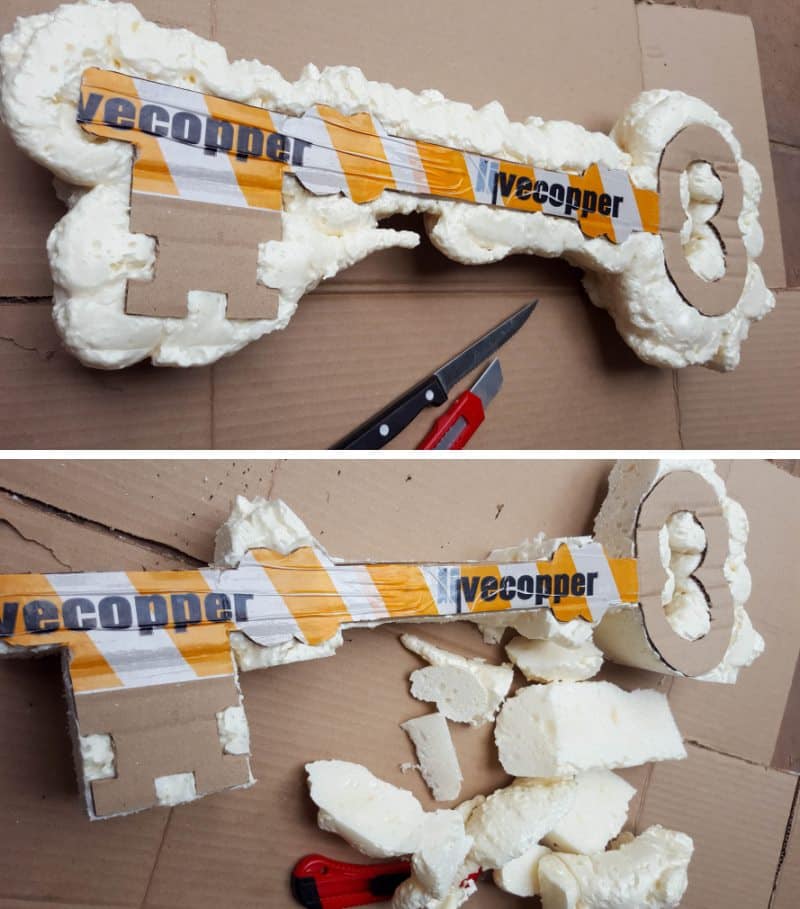Using the cardboard key as a guide cut the foam away