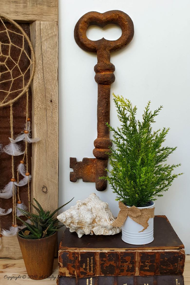 How to make a giant faux metal key. An experiment using expanding foam. Full tutorial on A Crafty Mix blog