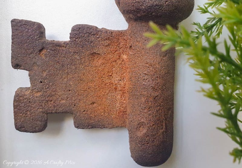 How to make a giant faux metal key. An experiment using expanding foam. Full tutorial on A Crafty Mix blog