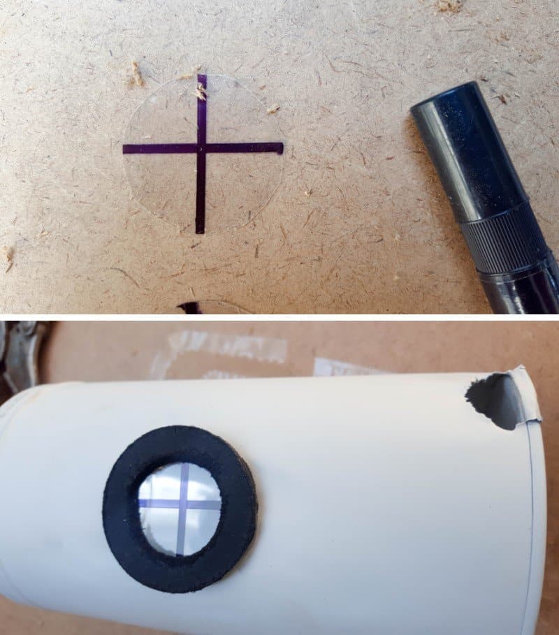 Draw a cross on the plastic circle and glue it to the painted wooden rings