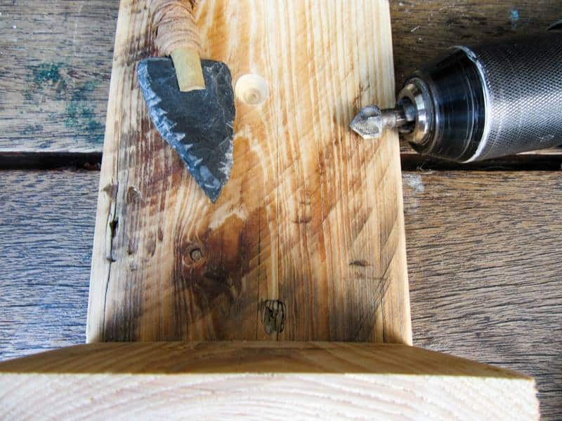 Glue the short piece to the longer piece at a 90 degree angle