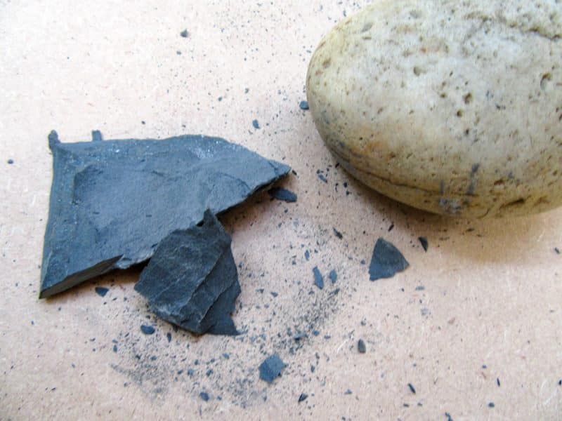 Use a pebble to chip away at the slate