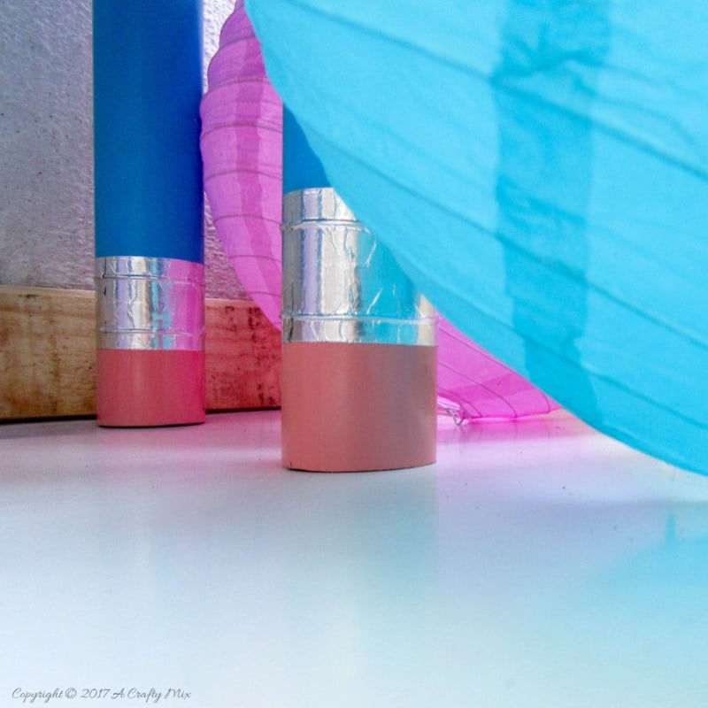 Turn any ordinary blackboard craft table into something different with these giant pencil legs. A quick and easy DIY upcycle tutorial that kids will love. #HomeDecor #ACraftyMix #PVC