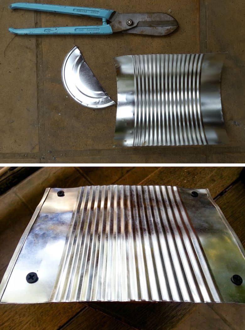 Cut a large tin can in half lengthwise and roll flat
