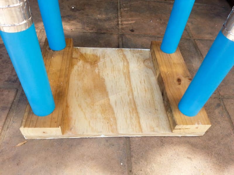 4 PVC pencils that need to be attached to the craft table