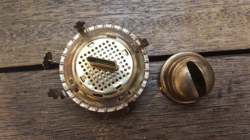 The burner consists of three parts, the top, the body and the wick channel