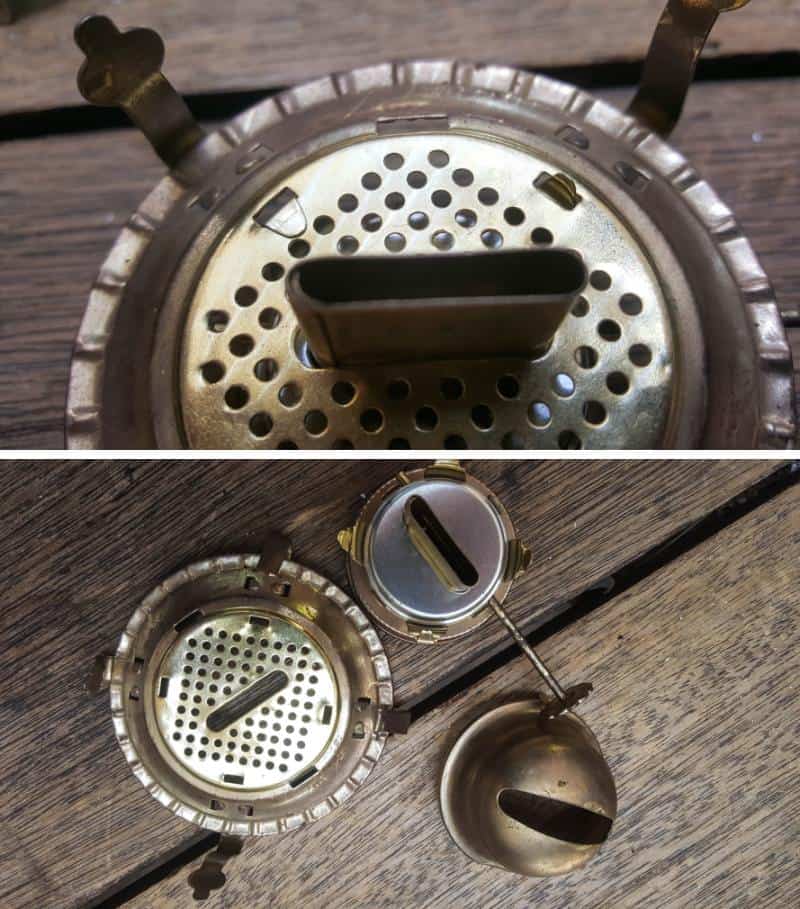 You should be able to Use your fingers to gently lift the tabs that are crimped into slots on the burner body and pull the bits apart.