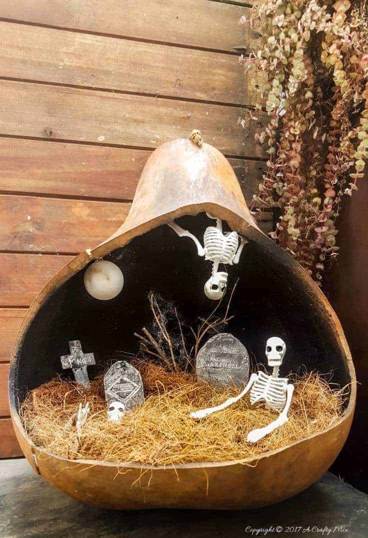 A quick and easy fairy graveyard that will instantly get you into the spirit of Halloween. And best of all, the moon shines at night #halloween #halloweendecorations