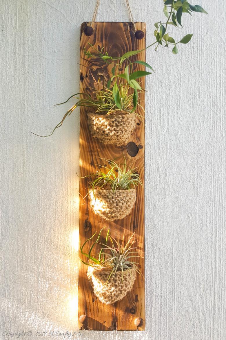 Add something special to your garden with this easy to make knitted planter. Perfect for air plants or succulents #Planter #ACraftyMix #GardenDecor