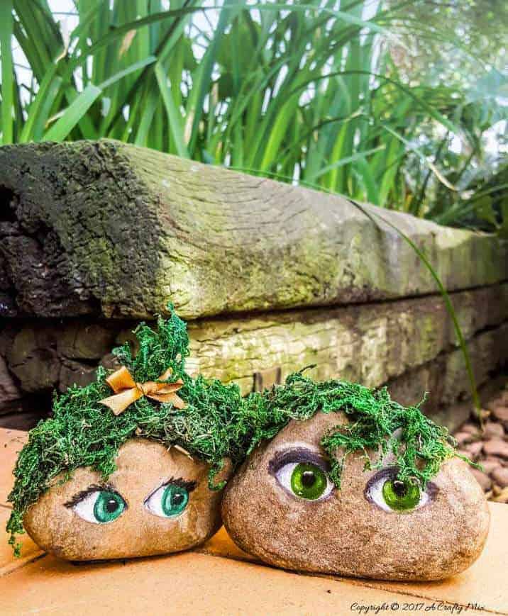 Make the cutest little mossy couple for the garden and easy tips on how to paint eyes on rocks