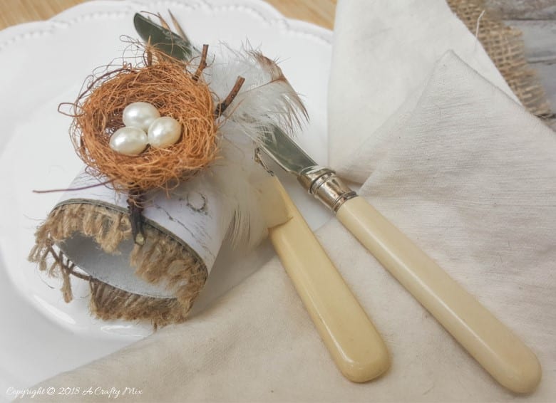 An easy and budget friendly craft tutorial for DIY bird&rsquo;s nest napkin rings using recycled materials is an inexpensive and beautiful way to make your own napkin ring holders! #craftsforkids #tabledecor #makeyourown