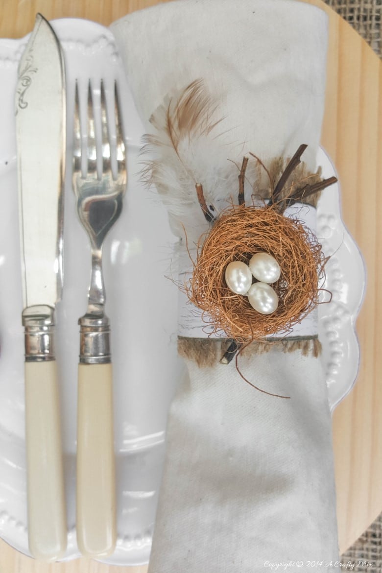 An easy and budget friendly craft tutorial for DIY bird&rsquo;s nest napkin rings using recycled materials is an inexpensive and beautiful way to make your own napkin ring holders! #craftsforkids #tabledecor #makeyourown