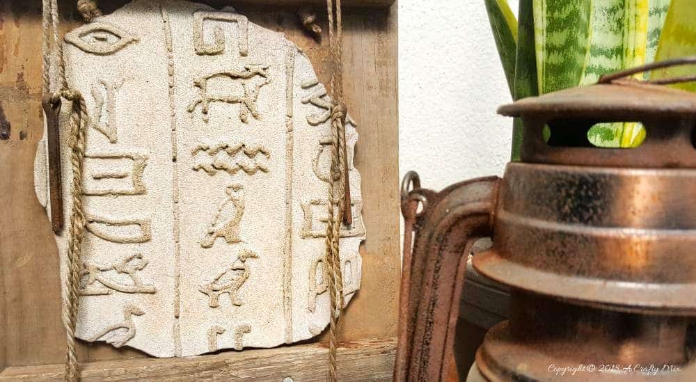 Evoke the magic and splendor of ancient Egypt and create your own Egyptian cartouche. Easy tutorial #DIYHomeDecor #Egyptiancrafts #ACraftyMix #Egyptionhieroglyphics