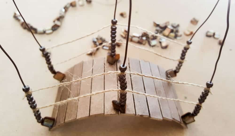 Add small beads to the wire