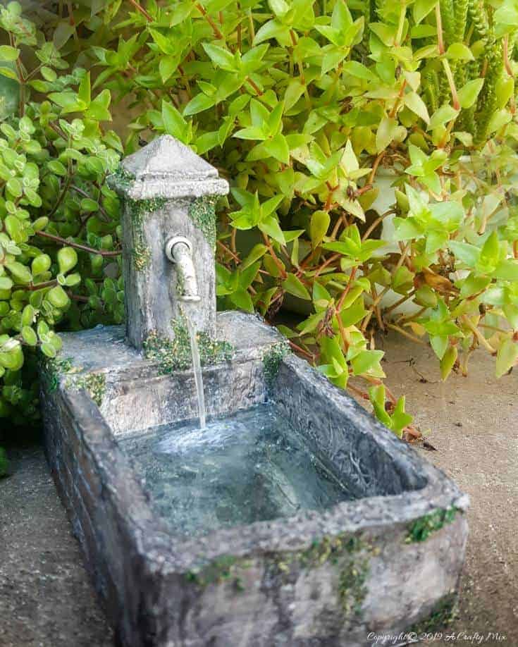 How to make a beautiful fairy water feature with "running" water #Miniaturewaterfeature #DIYFairyWaterFeature #WaterFeature #FairyGardens