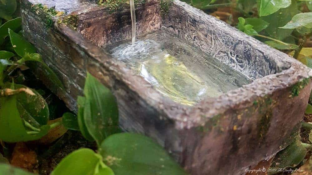 Love the reflections in the "water" #DIYFairyWaterFeature #WaterFeature #FairyGardens