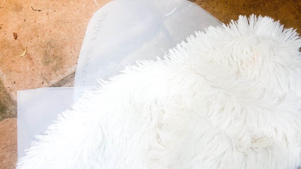 Using the patter pieces to cut the body and neck for the llama chair. DIY Tutorial from A Crafty Mix #llamaDIY #DIYTutorial #LlamaChair
