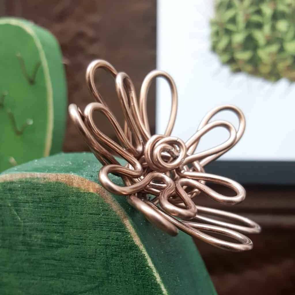 Add a wire flower. #BrownThumb #WoodenCacti #DIYTutorial #ACraftyMix