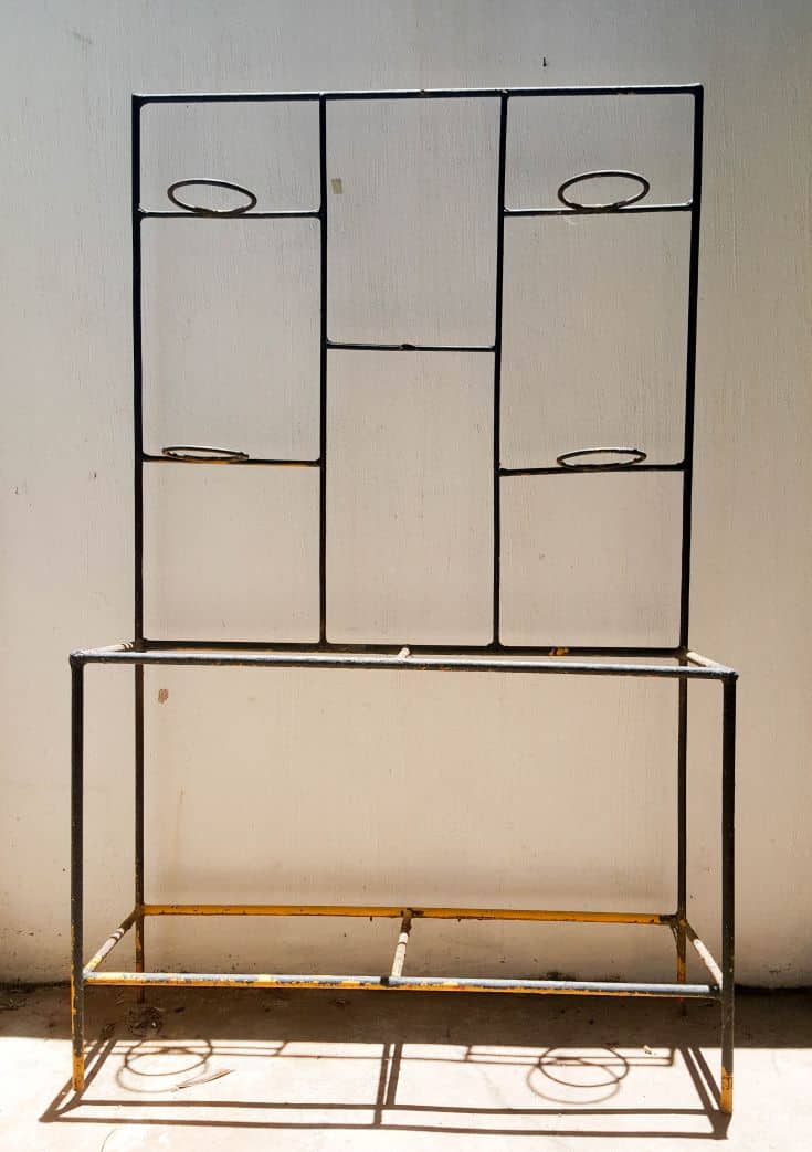 An old metal plant stand makeover - #tinceilingideas #tinceilinghomedecor #tinceilingtilesrepurposed #plantstandideas #ACraftyMix