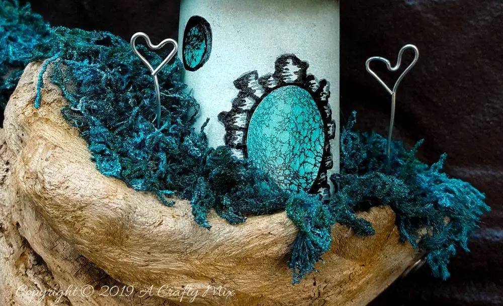 A close up view of the driftwood fairy scape and door