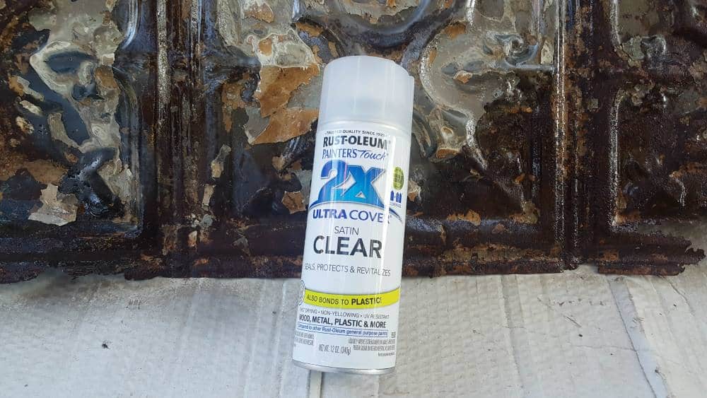 Rustoleum to protect and seal the ceiling tiles and bring out all those beautiful patterns and colors - #tinceilingideas #tinceilinghomedecor #tinceilingtilesrepurposed #plantstandideas #ACraftyMix