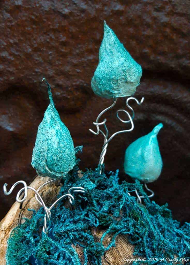 Whoville inspired trees made from cotton balls. Make a few to create an unusual fairy scape #FairyGarden #FairyScape #FairyTutorial #ACraftyMix #CraftTutorial #FairyCraft