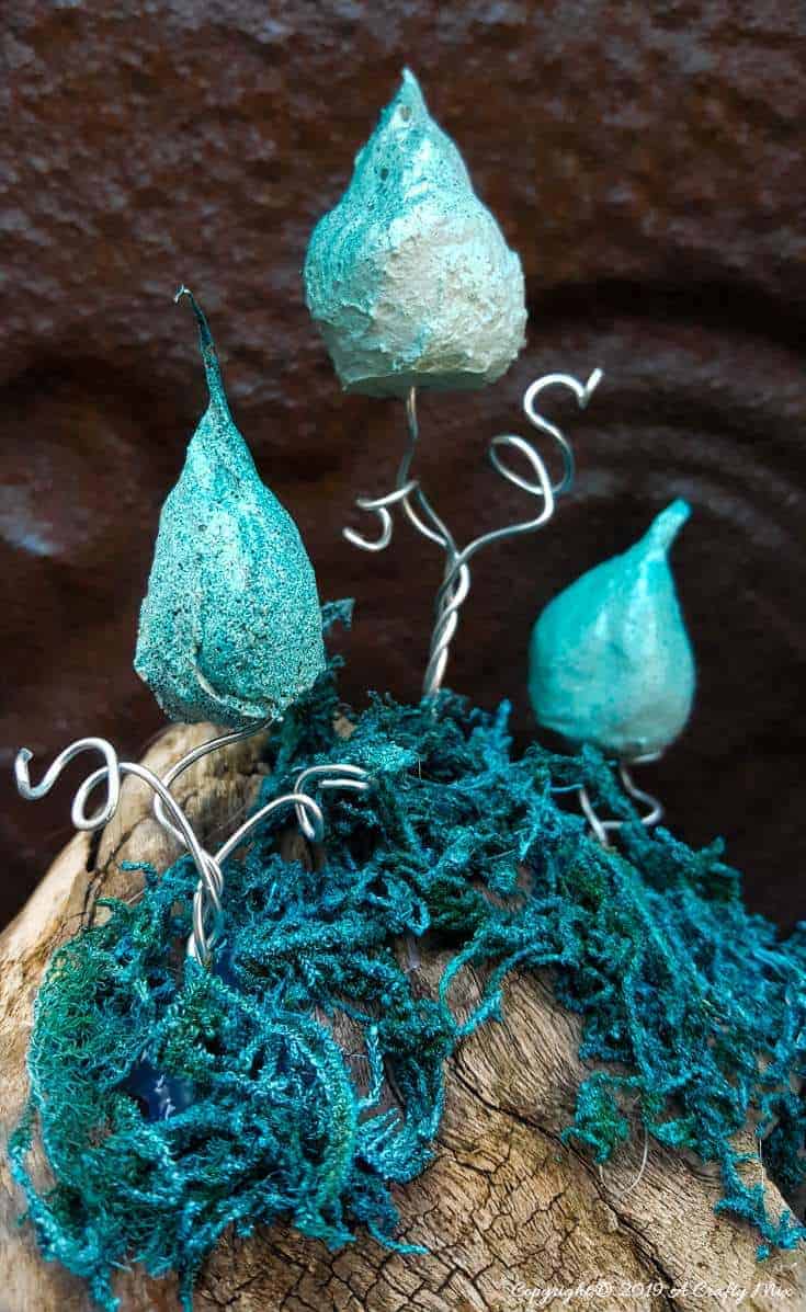 Whoville inspired Truffula trees made from cotton balls. Make a few to create an unusual fairy scape #FairyGarden #FairyScape #FairyTutorial #ACraftyMix #CraftTutorial #FairyCraft