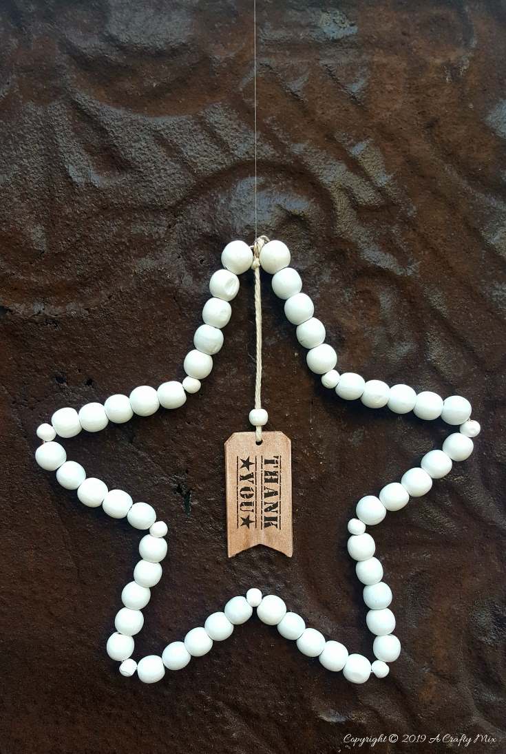 An easy to make bead and wire star is a great way to say thank you to your co-workers or that teacher that went the extra mile #appreciationgift #thankyou #giftidea #easycraft #farmhousecraft #beadstar #acraftymix