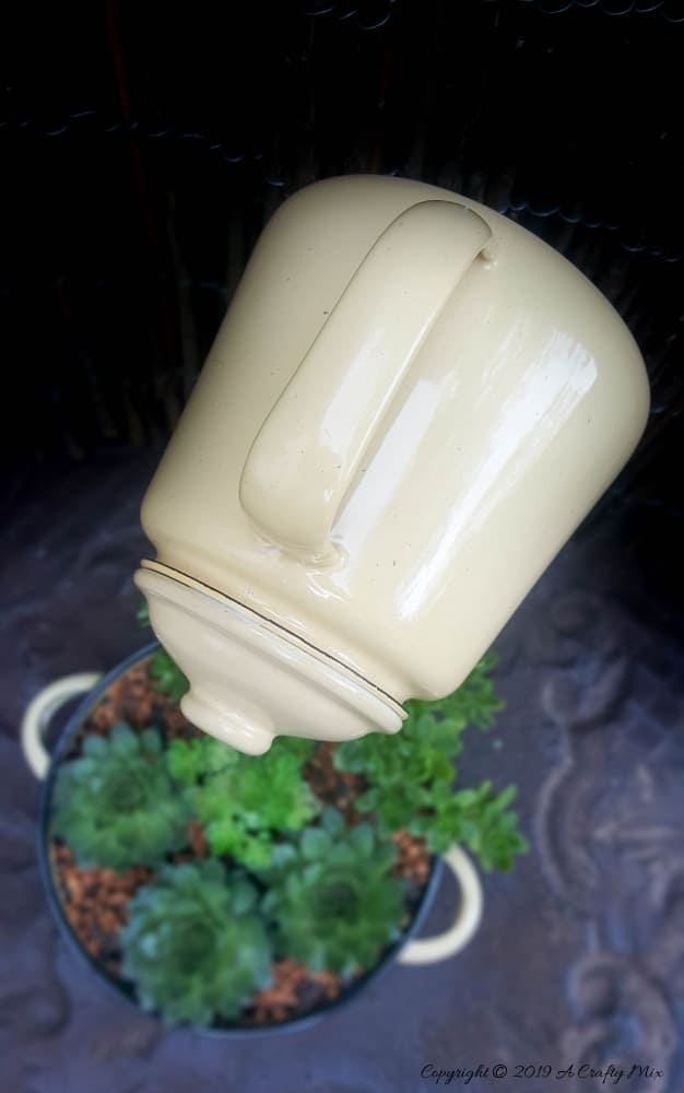 A top down view of the floating teapot and succulent planter. #SucculentPlanter #FloatingTeapot #ACraftyMix #DIYTutorial #ForkRepurpose #CrazyCrafts