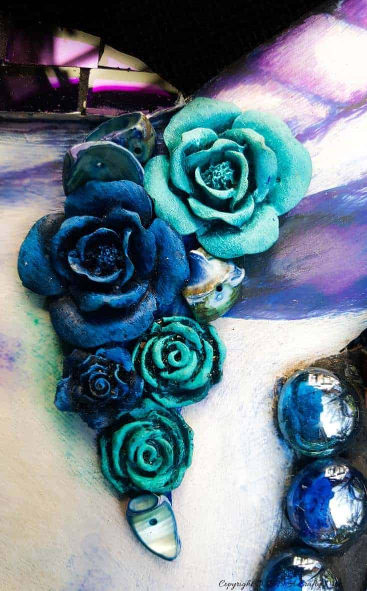 ceramic flowers add another dimension to the mosaic unicorn #mosaicprojects #tipsandtricks #howtomake #mixedmediamosaic #acraftymix #unicornspit #mosaicart #mosaicideas #unicornart