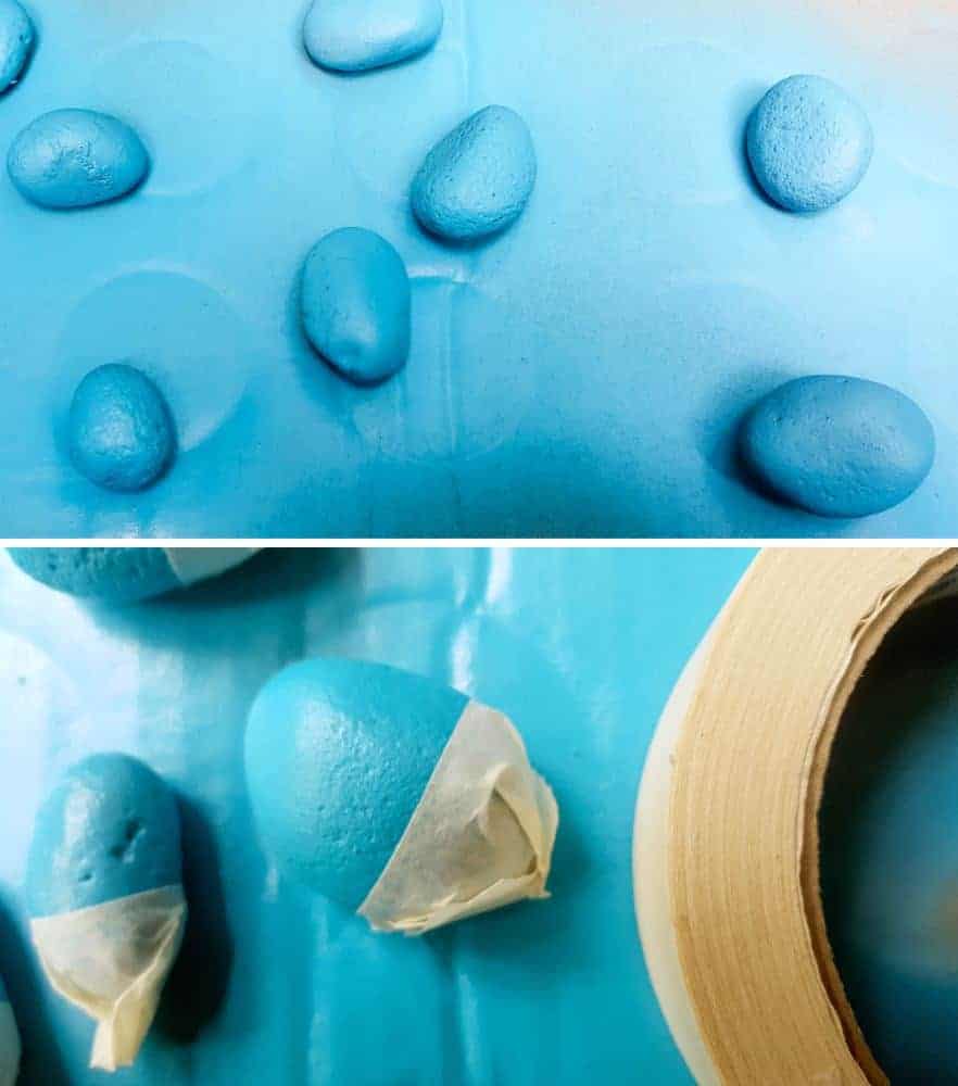 Paint the bottom blue. Easy child friendly craft idea. #minioncraftideas #minioncrafts #pebbleminions #evilminions #craftideas #kidscrafts #noughtsandcrosses #tictactoe #acraftymix