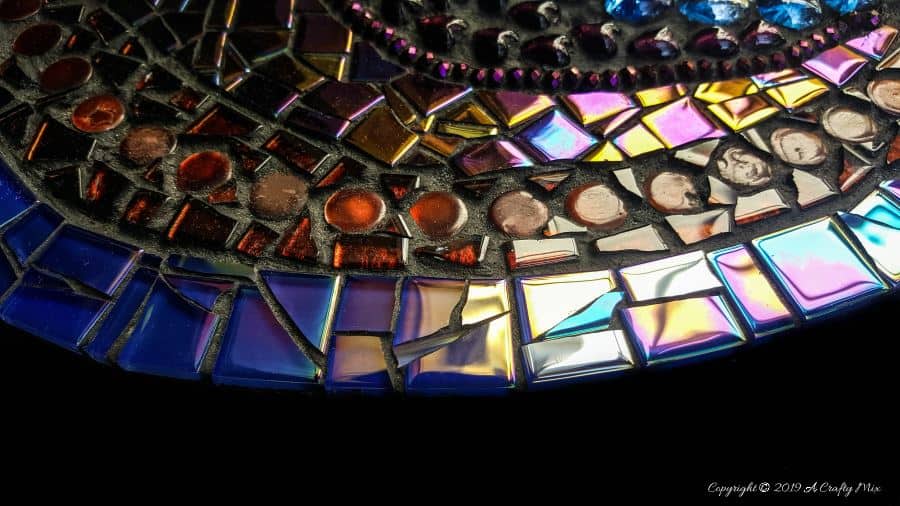 A close up of the bottom end of the mixed media mosaic unicorn #mosaicprojects #tipsandtricks #howtomake #mixedmediamosaic #acraftymix #unicornspit #mosaicart #mosaicideas #unicornart