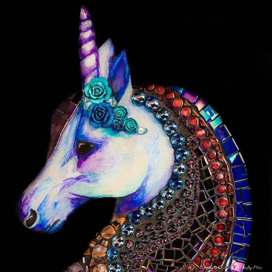 The colors in this mixed media mosaic unicorn are beautiful. Great tutorial that shows how to do something similar with lots of tips and tricks. #mosaicprojects #tipsandtricks #howtomake #mixedmediamosaic #acraftymix #unicornspit #mosaicart #mosaicideas #unicornart