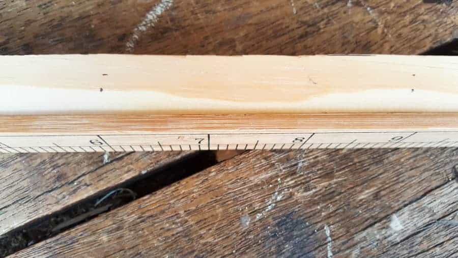Glue the 1 x 1 to the yardstick and measure equal distances before drilling the holes. #photodisplay #diy #diyproject #photodisplay #familyphotos #home #homedecor #acraftymix #instagramphotos #instax