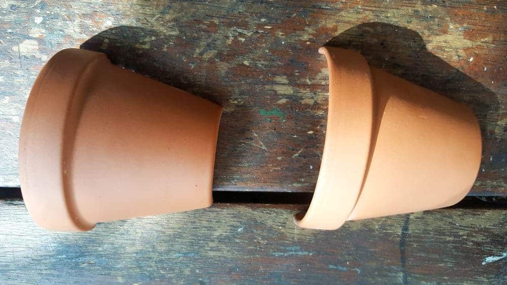 Two equal unbroken halves of a terracotta pot #terracottapots #treeplanters #easycrafts #planterideas #terracottaplanters #acraftymix