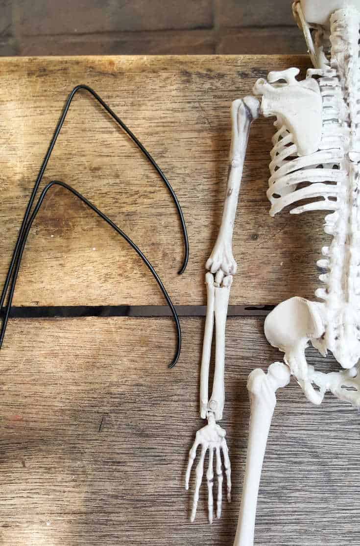 Bending the wire to make the frame for the vampire wings. #ACraftyMix #FunHalloweenCraft #EasyHalloweenCraft #HalloweenDIY #HalloweenCraft #HolidayCraft