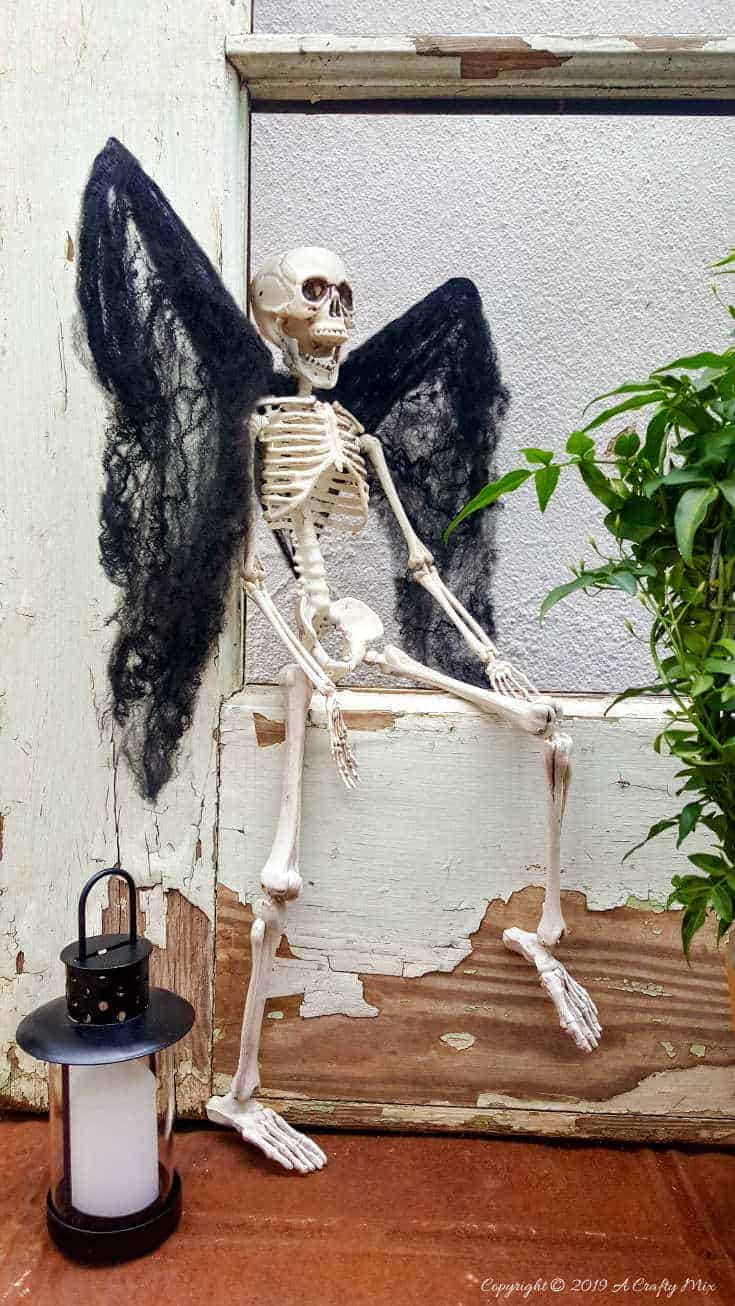 Sergeant Skullie with his vampire wings is just chillin' waiting for Halloween to come around. #ACraftyMix #FunHalloweenCraft #EasyHalloweenCraft #HalloweenDIY #HalloweenCraft #HolidayCraft