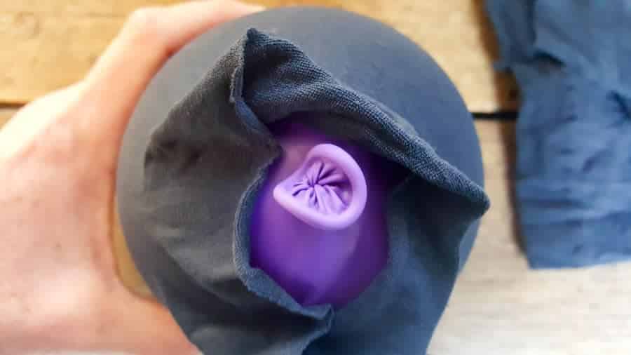 A view of the balloon inside the stocking #concretepumpkin #fallcrafts #acraftymix #fallDIY #candleholders #pumpkindecorating