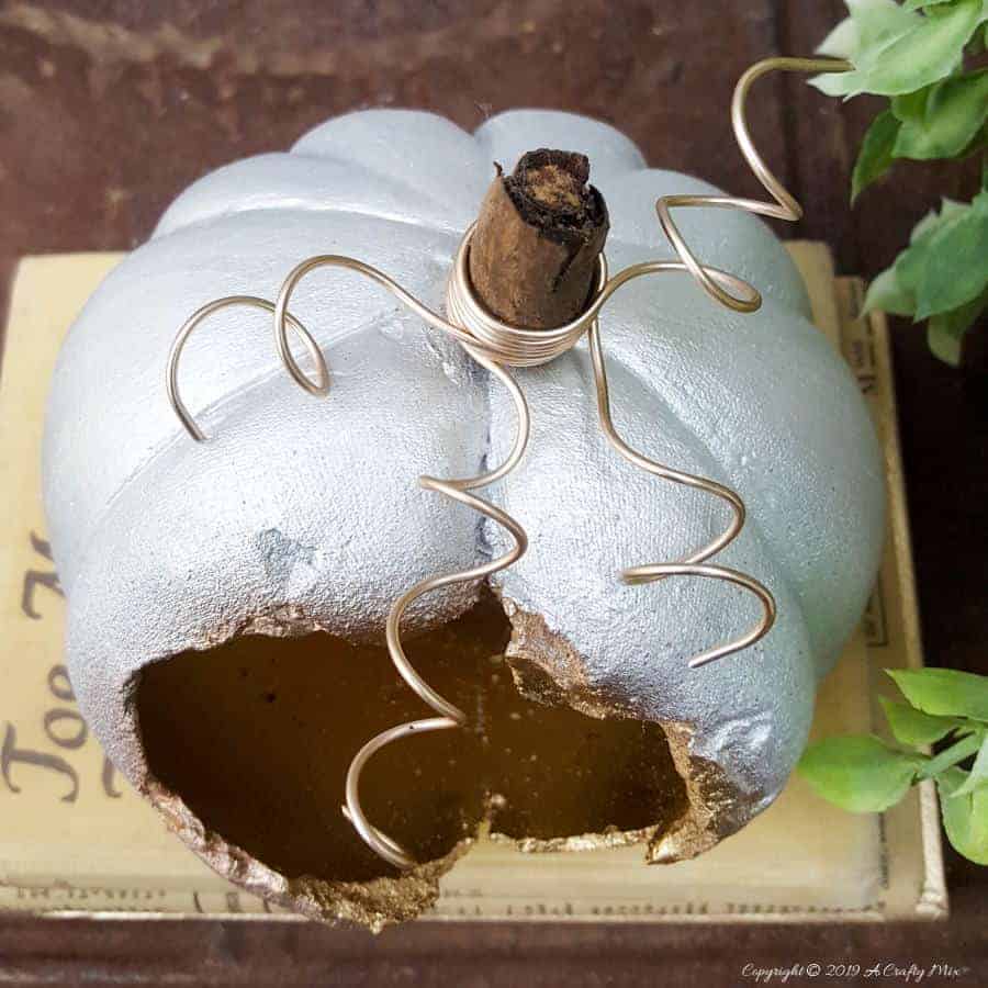 Top down view of the hollow concrete balloon #concretepumpkin #fallcrafts #acraftymix #fallDIY #candleholders #pumpkindecorating