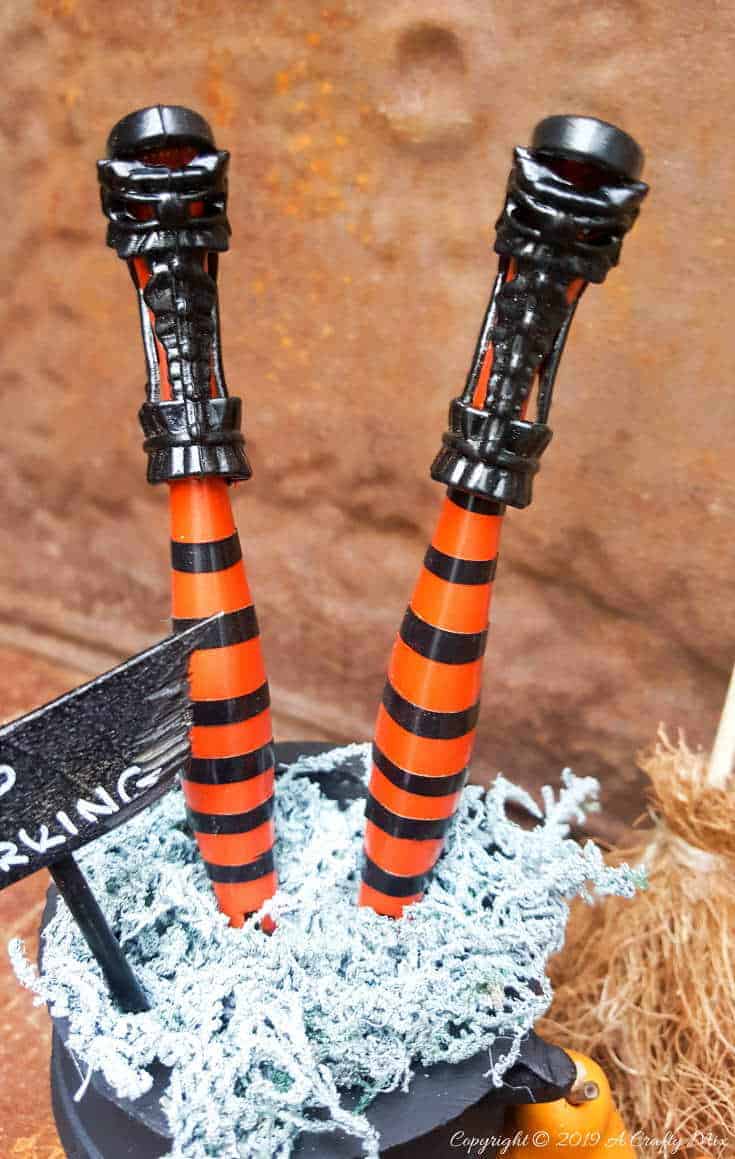 How to make wickedly wonderful miniature witch legs in a cauldron. Inspired by Grandin Road #Halloweendecor #dollmakeover #spidergirl #acraftymix #halloweentutorial #halloweenDIY #witchlegs #grandinroad #miniaturehalloween