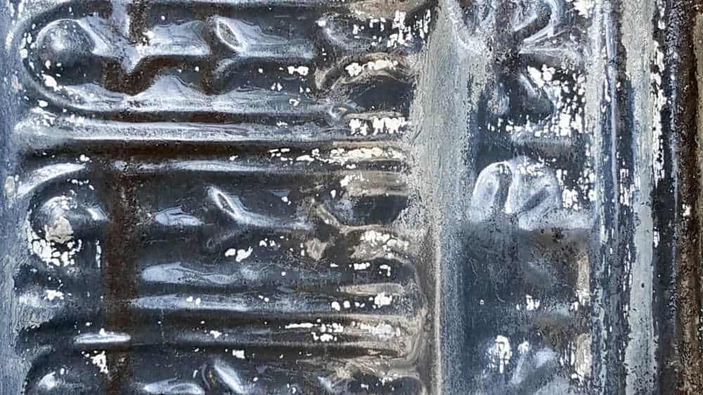 Remove any rust with a wire brush #tinceiling  #birdhouse
