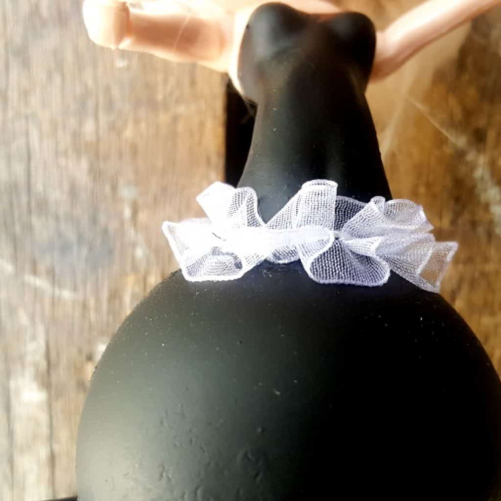 Add a bit or tulle or a ribbon to hide the join #Halloweendecor #dollmakeover #spidergirl #acraftymix #halloweentutorial #halloweenDIY