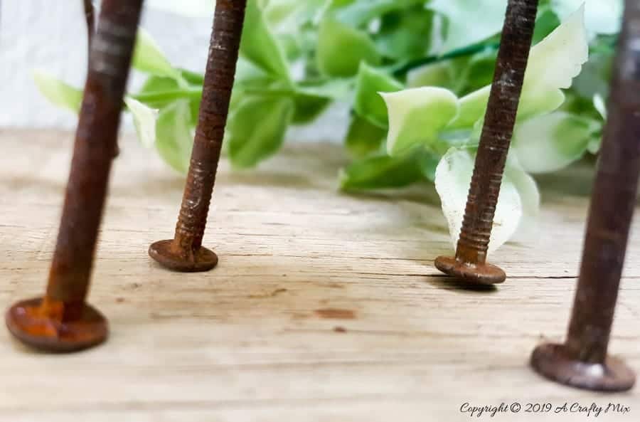 Love the look of the rusty nail reindeer legs. Too cute #woodenreindeer #DIYReindeer #DIYRustyReindeer #RustyNailrepurpose #acraftymix # Reindeerdecor #reindeertemplate