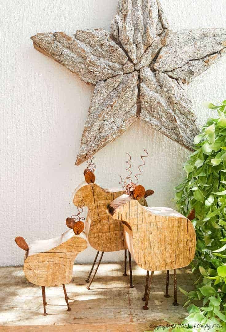 Easy DIY Rustic, repurposed Reindeer Family Ornaments - a lovely way to use up those old rusty nails and add something special to your festive decor Great gift idea too! #woodenreindeer #DIYReindeer #DIYRustyReindeer #RustyNailrepurpose #acraftymix # Reindeerdecor #reindeertemplate