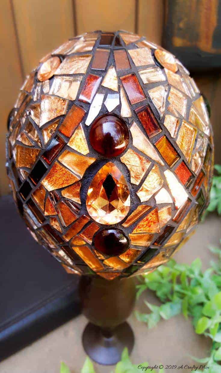 How to make a beautiful Faberge Mosaic Egg. Includes all the tips and tricks you need to know to mosaic on a curved surface #Mosaicart #FabergeMosaic #MosaicTips #acraftymix #Mosaictricks #MosaicDIY #MosaicHowTo #RussianEggs