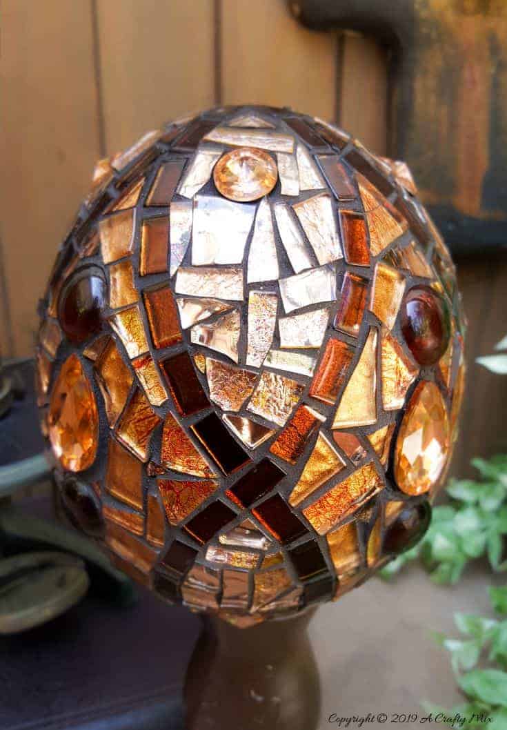 How to make a beautiful Faberge Mosaic Egg. Includes all the tips and tricks you need to know to mosaic on a curved surface #Mosaicart #FabergeMosaic #MosaicTips #acraftymix #Mosaictricks #MosaicDIY #MosaicHowTo #RussianEggs